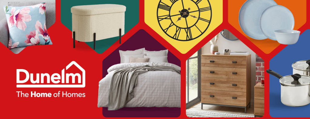 Red background with image of a chest of drawers, silver saucepans, white plates and bowls, a stylish bed with white duvet, a clock and a stylish cushion with flower print. Text reads, "Dunelm: The Home of Homes." Affiliated with SpookyMrsGreen.com mindful parenting and modern pagan lifestyle blog.